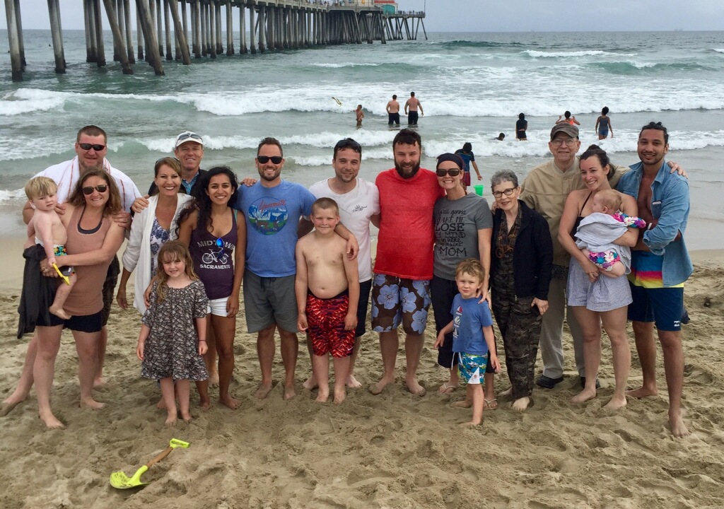 Rob McCauley with family on the beach